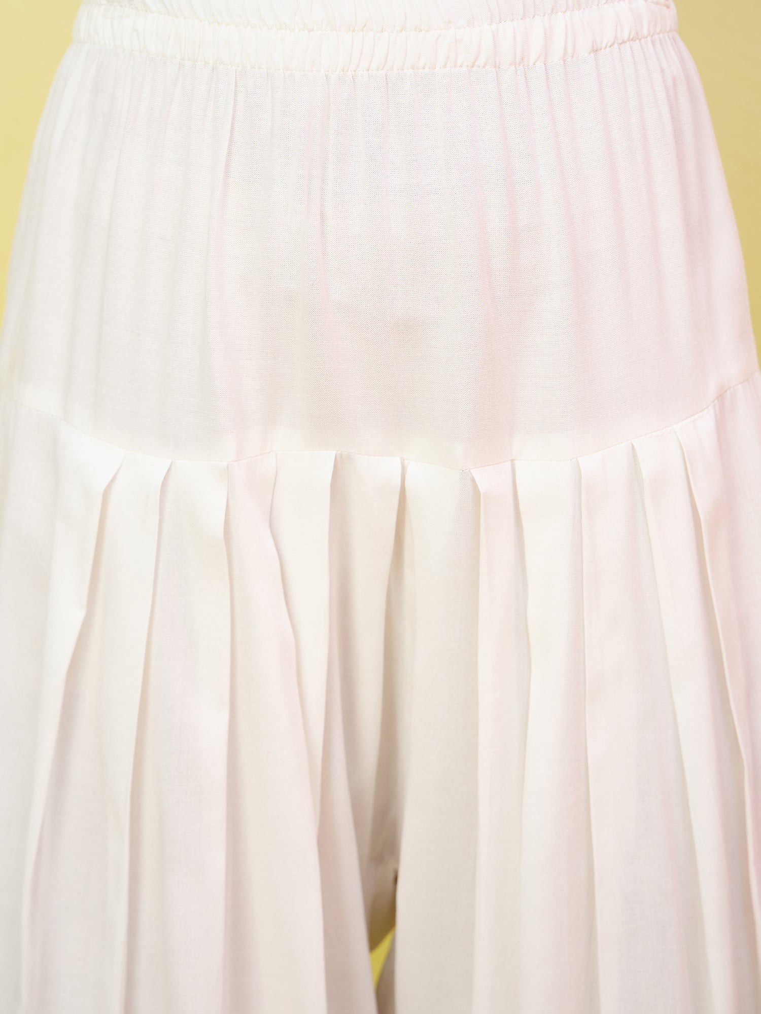Yellow Peplum White Salwar Set
