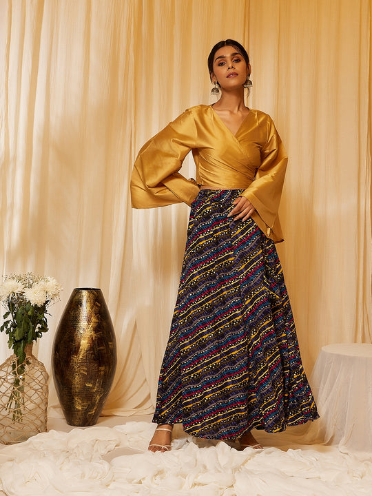 GOLD TOP WITH MUSTARD LEHARIYA SKIRT