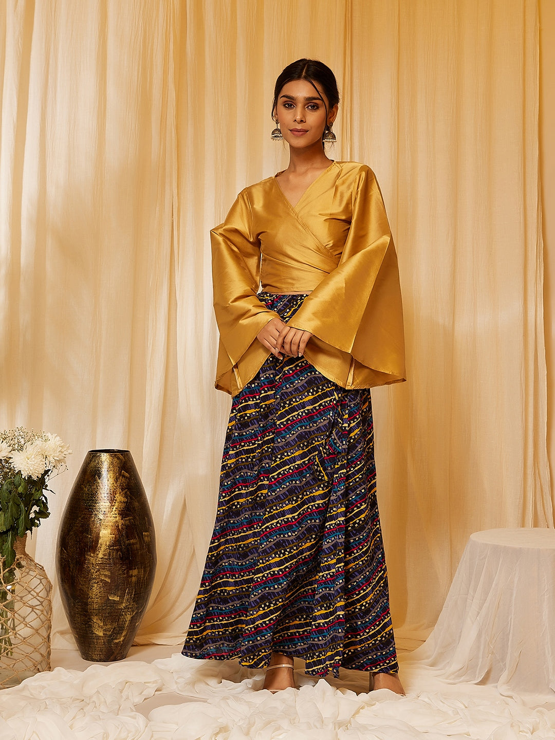 GOLD TOP WITH MUSTARD LEHARIYA SKIRT