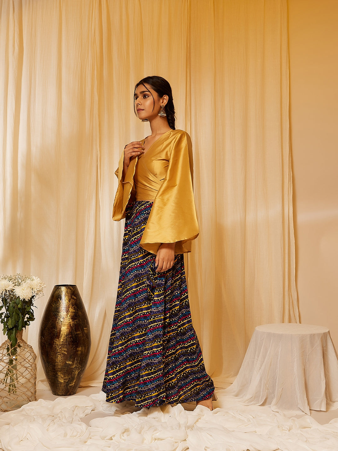 GOLD TOP WITH MUSTARD LEHARIYA SKIRT