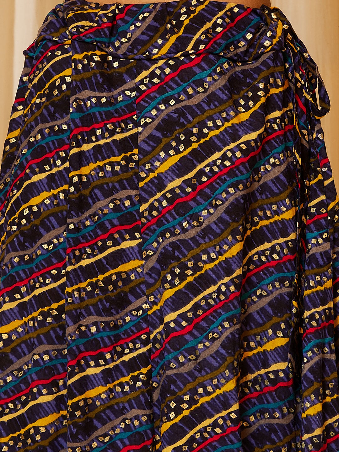 GOLD TOP WITH MUSTARD LEHARIYA SKIRT