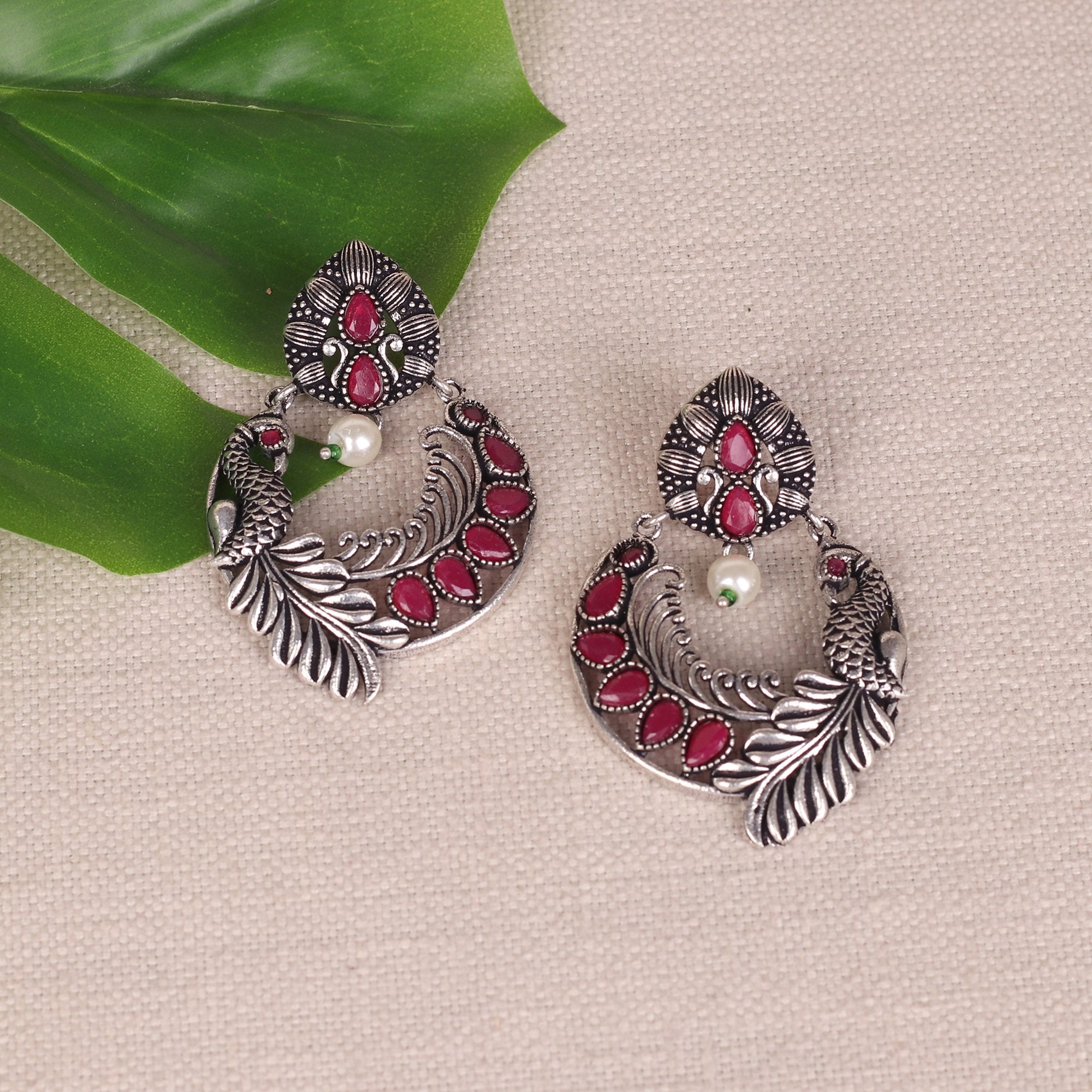 Bird Motif German Silver Earrings With Red Stones