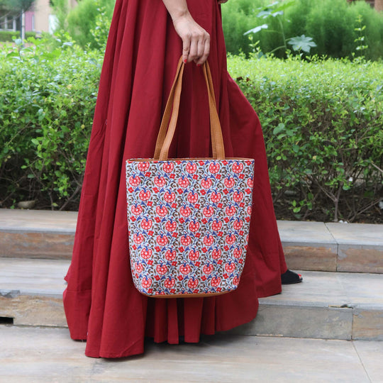 A FLORAL PARODY TOTE BAG